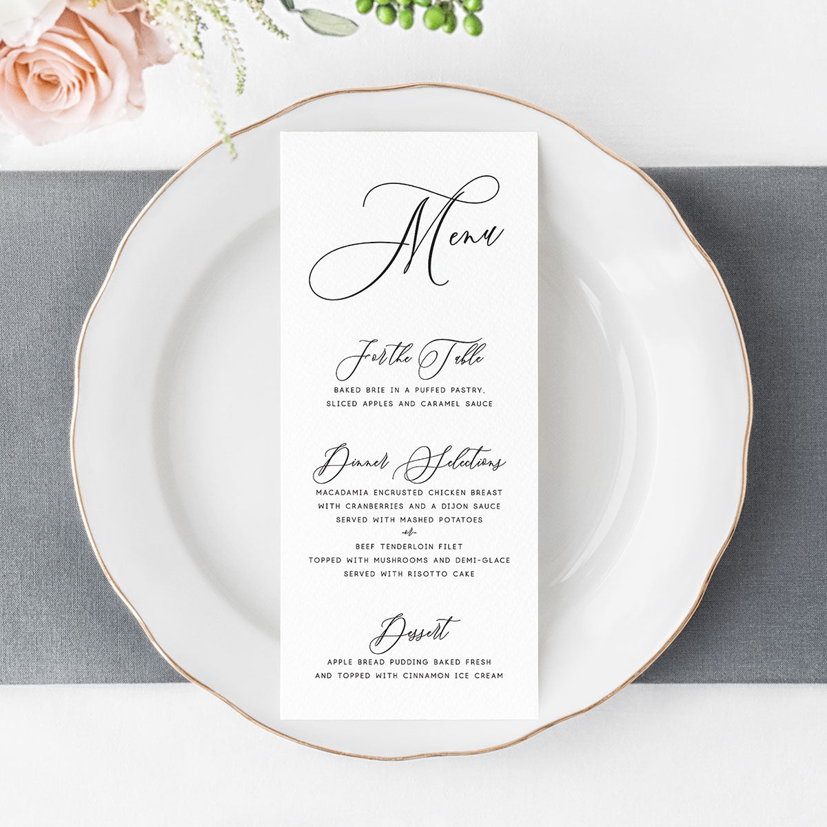 wedding menu card with calligraphy script and traditional block fonts printed on white cardstock