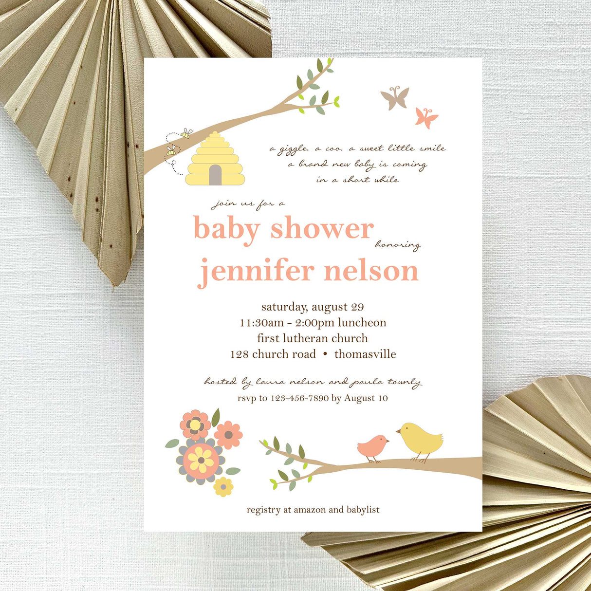 peach and brown baby shower invitation with birds, bees, and butterflies illustrations