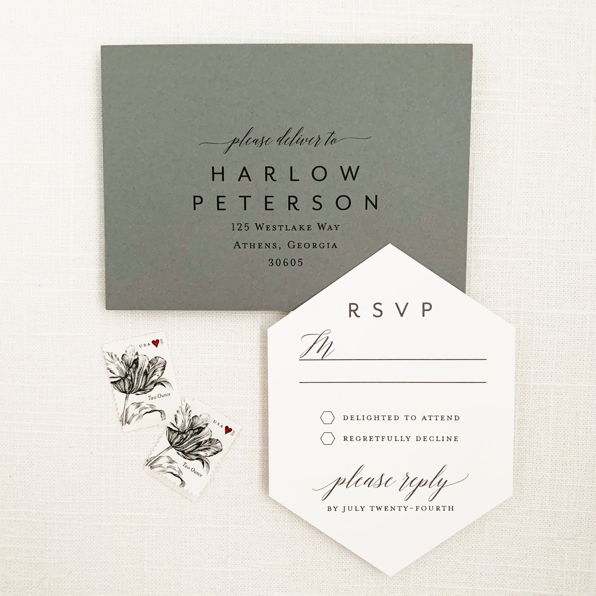 geometric shaped rsvp card with modern fonts printed on white cardstock and grey rsvp envelope with addressing