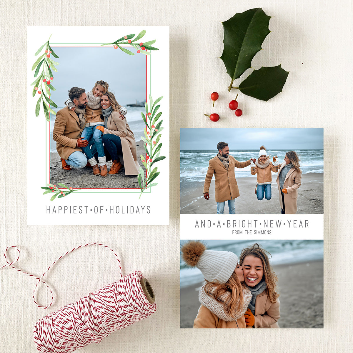 custom holiday photo card with greenery with red berry frames