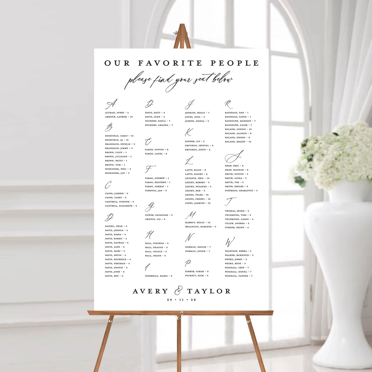 wedding seating chart with modern fonts printed on white foamboard