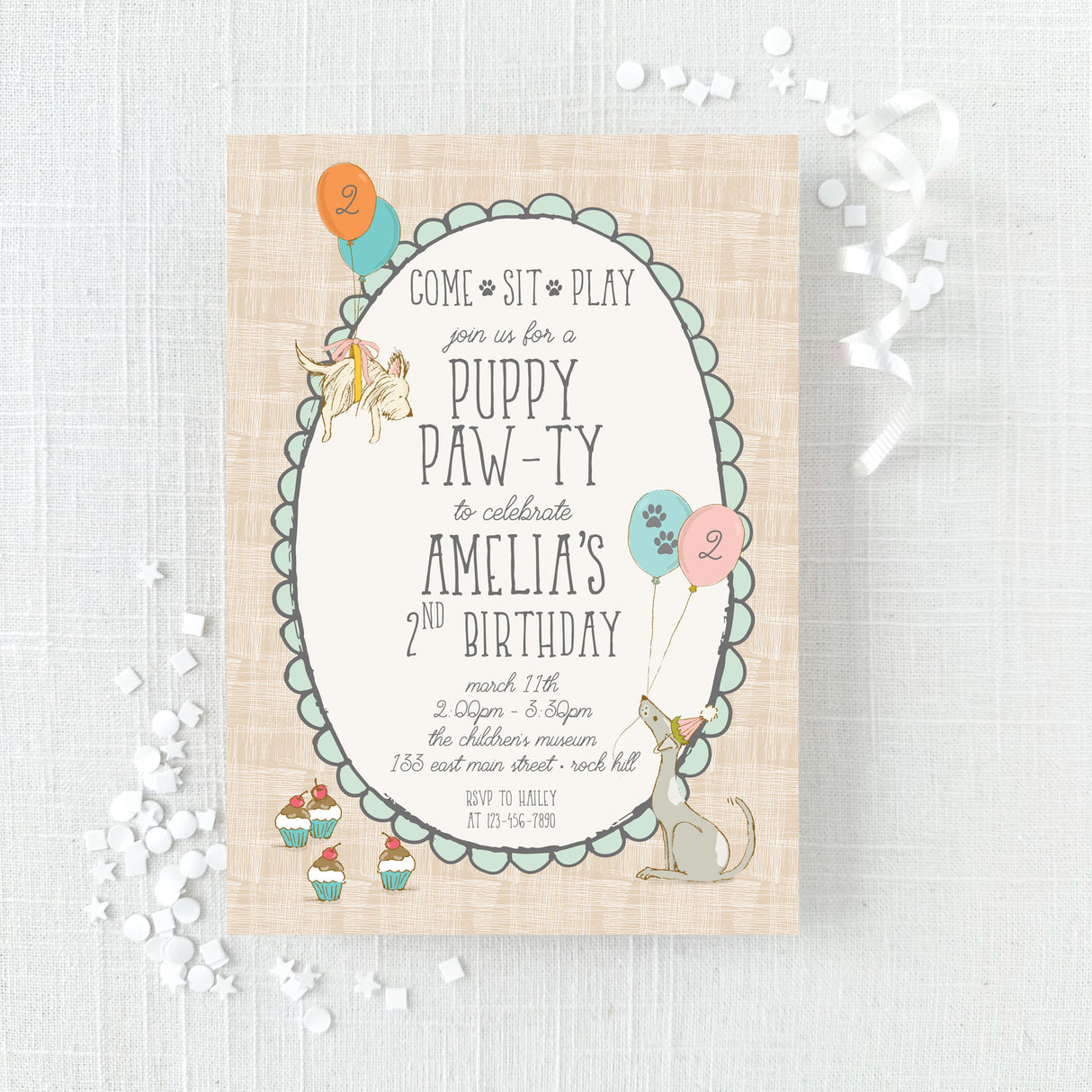 Birthday party invitation for puppy themed party with puppy, balloon, and cupcake illustrations