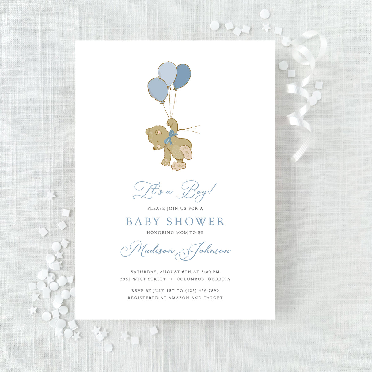blue baby shower invitation featuring a cute bear with balloons in blue colors printed on white cardstock