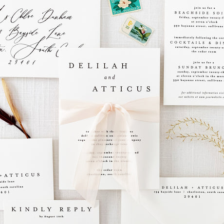 Modern and minimal wedding invitation with light pink silk ribbon