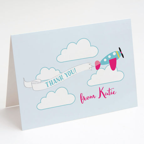 thank you cards with pink and blue airplane design printed on white cardstock