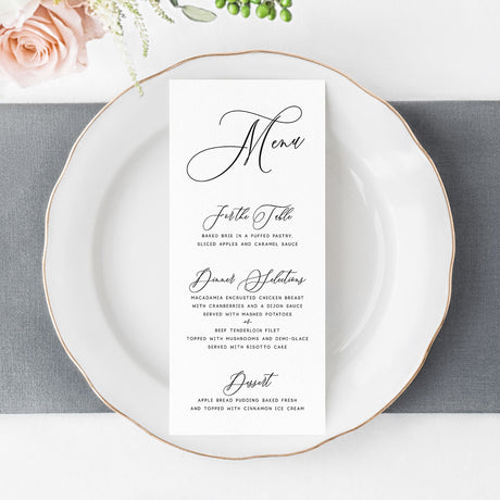 wedding menu card with calligraphy script and traditional block fonts printed on white cardstock