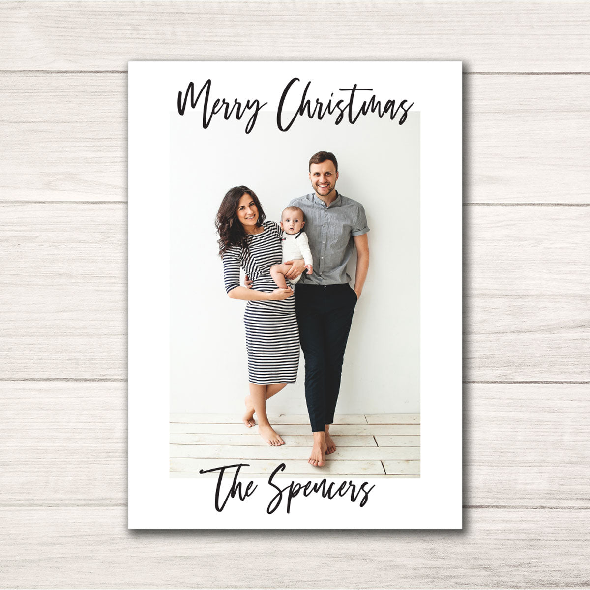 modern black and white Christmas holiday card with modern script font and personalized photo