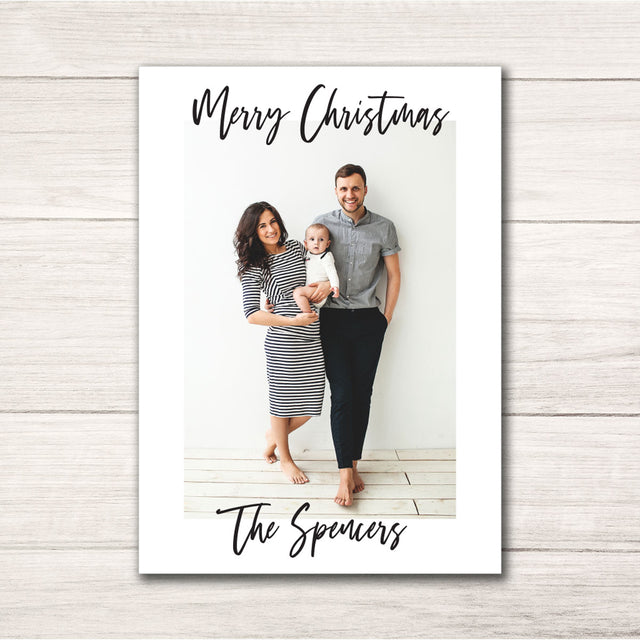 modern black and white Christmas holiday card with modern script font and personalized photo