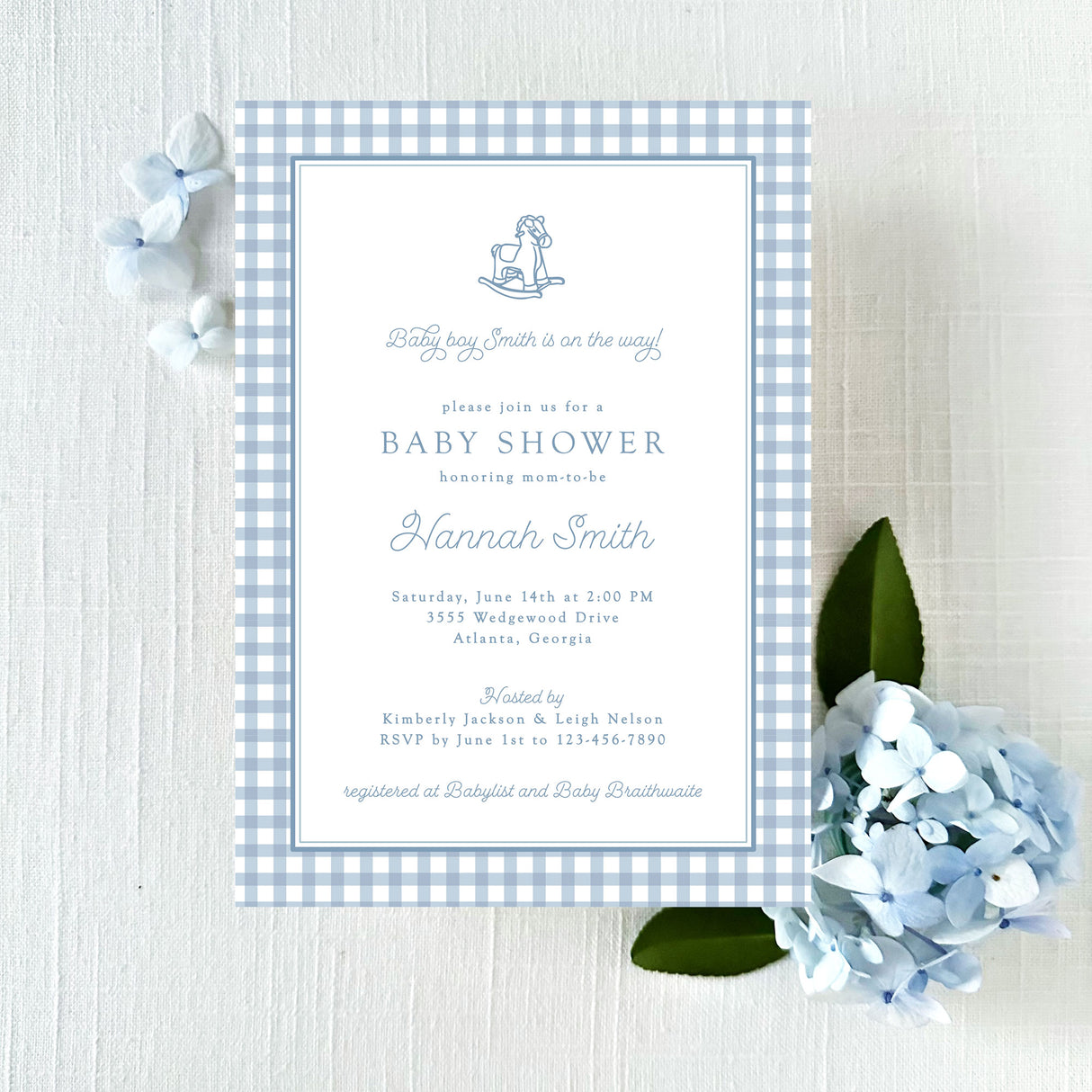 light blue baby shower invitation with blue gingham border and vintage rocking horse illustration printed on white cardstock