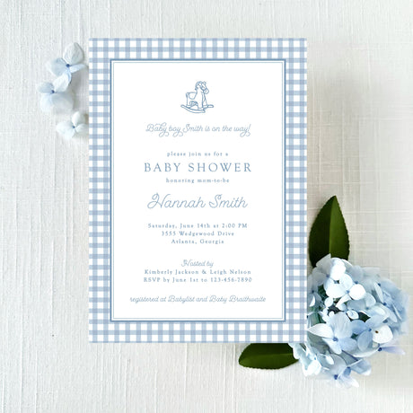 light blue baby shower invitation with blue gingham border and vintage rocking horse illustration printed on white cardstock
