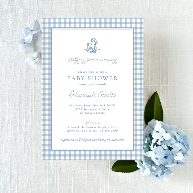 light blue baby shower invitation with blue gingham border and vintage rocking horse illustration printed on white cardstock