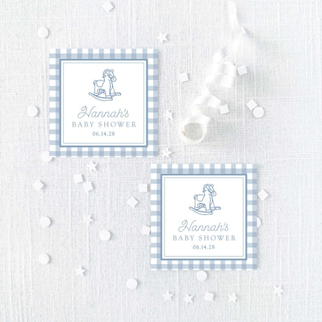 square baby shower favor stickers with blue gingham border and vintage rocking horse illustration