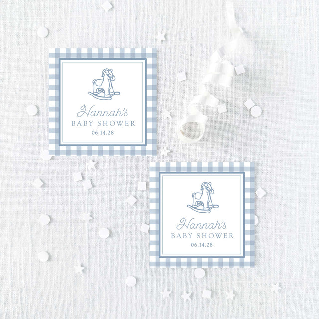 square baby shower favor stickers with blue gingham border and vintage rocking horse illustration