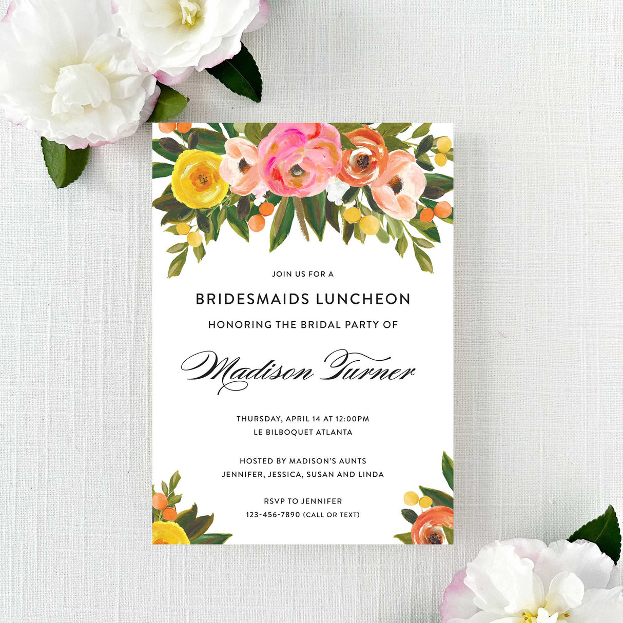 colorful floral invitation for a bridesmaids luncheon or bridal shower with multicolored flowers and greenery printed on white cardstock