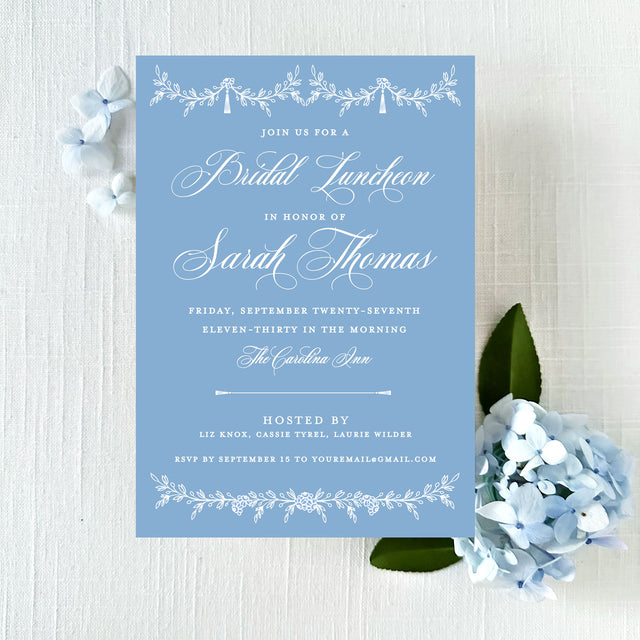 classic blue bridal luncheon or bridal shower invitation with white text printed on white cardstock