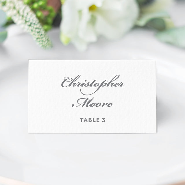 grey folded place card in traditional script and block font