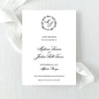 classic black and white save the date with wreath monogram