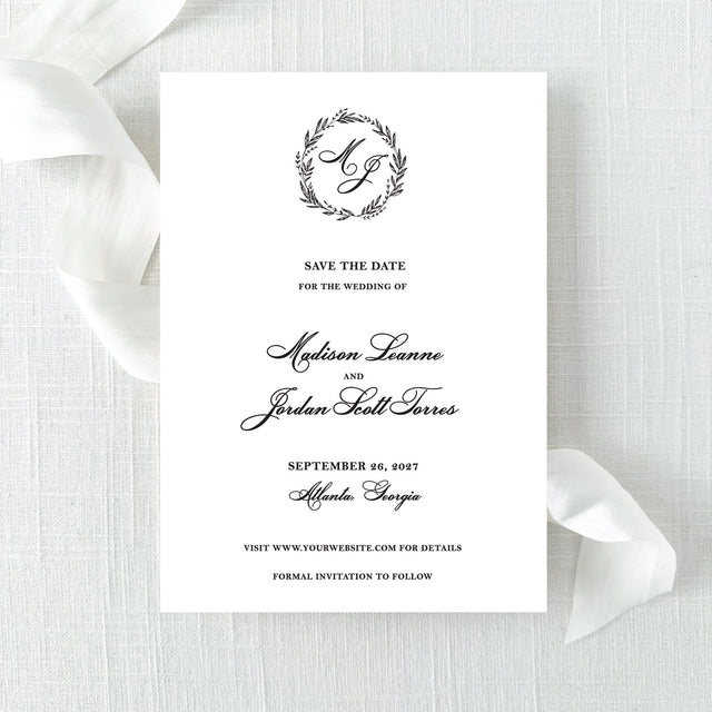 classic black and white save the date with wreath monogram