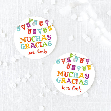 round favor tag with colorful feista bunting  and muchas gracias text