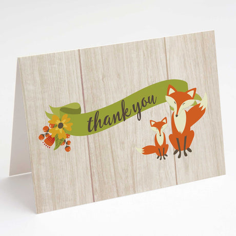 Greeting card with fox illustration and 'thank you' text on a wooden texture background