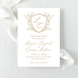 Wedding save the date with gold monogram floral crest with script font