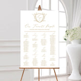 24 x 36 seating chart with gold monogrammed floral crest
