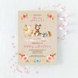 mama bear baby shower invitation with forest animals and floral decorations on a tan background with multi colored florals