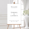 minimal black and white wedding welcome sign with the couple's names and wedding date