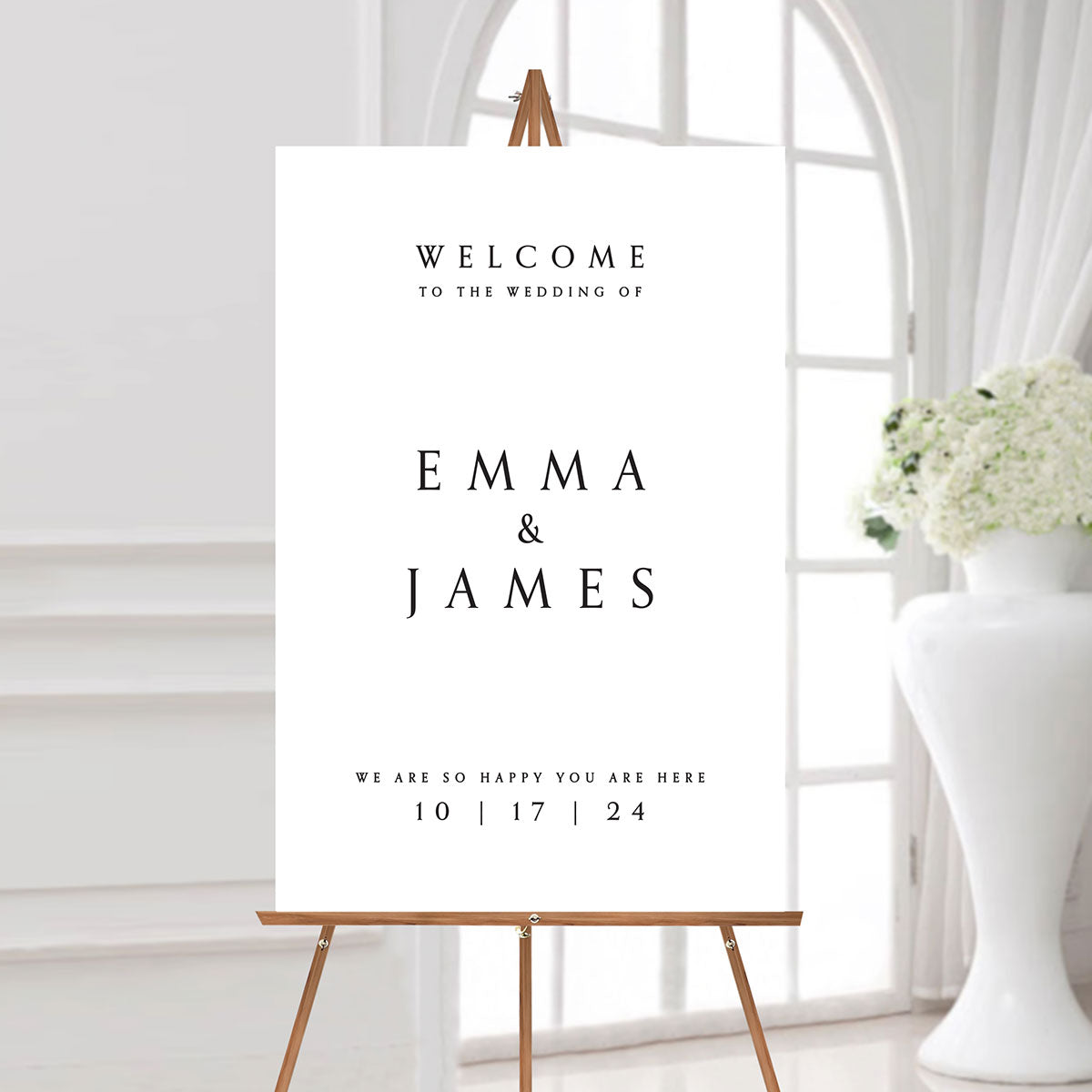 minimal black and white wedding welcome sign with the couple's names and wedding date