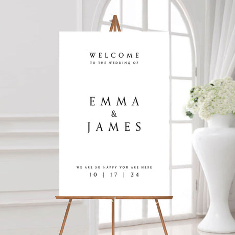 minimal black and white wedding welcome sign with the couple's names and wedding date