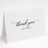 modern black and white wedding thank you notes featuring couple's names