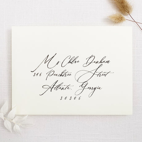 modern minimal invitation envelope with calligraphy script font guest addressing
