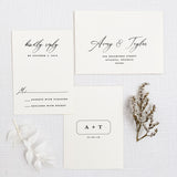 minimal rsvp card with modern monogram logo on back and envelope