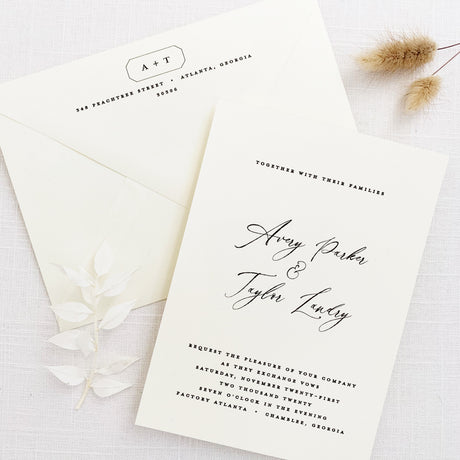 modern and minimal wedding invitation and envelope with return addressing