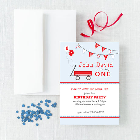 red wagon birthday party invitation with white envelope