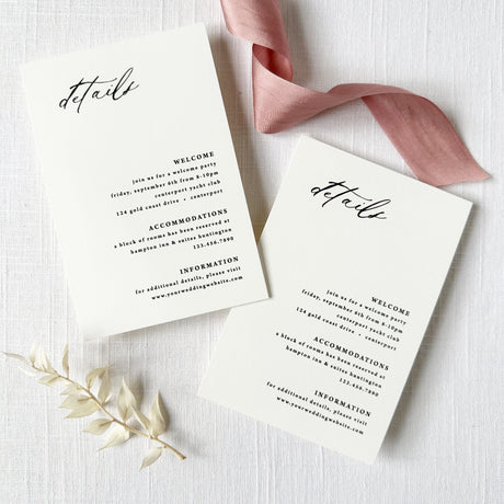 white wedding details card with black script and block fonts printed on cardstock