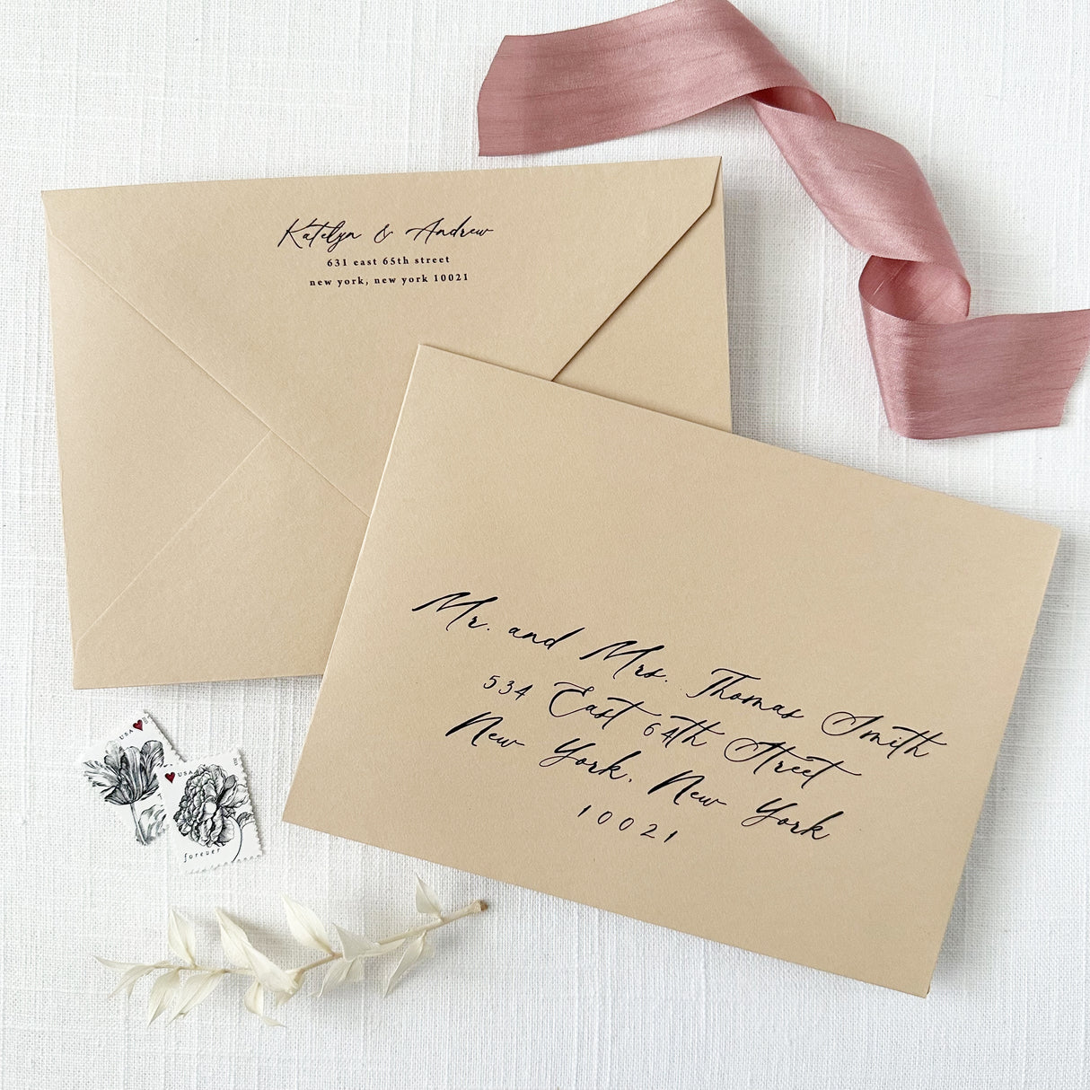 tan wedding invitation envelopes featuring return and guest addressing