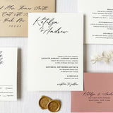 white wedding invitation with modern black calligraphy fonts