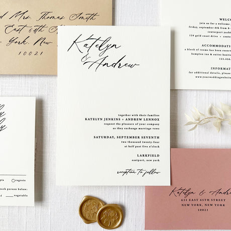 white wedding invitation with modern black calligraphy fonts