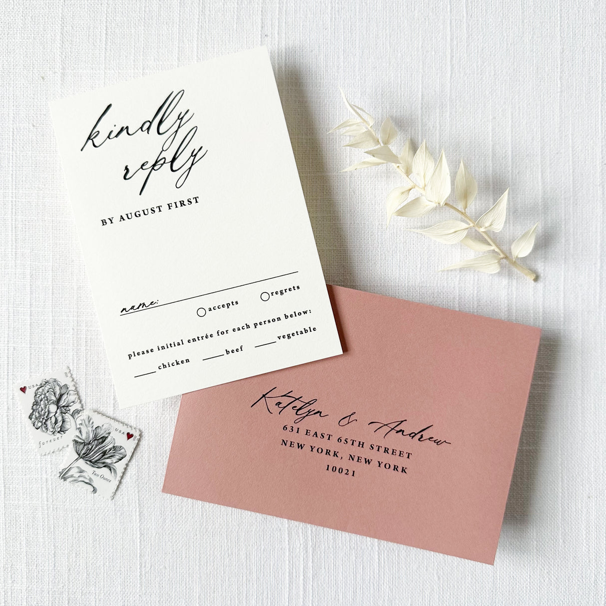 black and white wedding rsvp card with dusty rose envelope