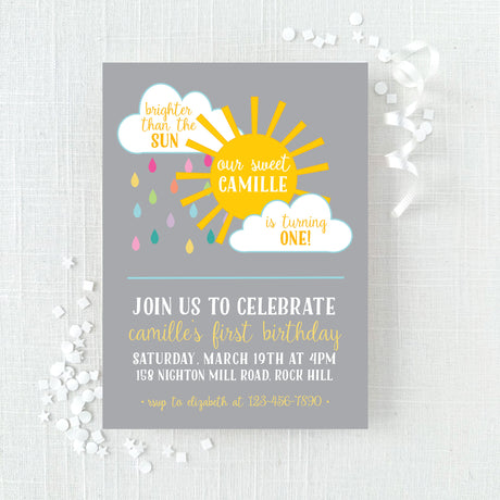 Birthday invitation with yellow sun and clouds with colorful rain design printed on white cardstock
