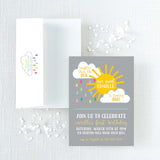 Children's birthday invitation with yellow sun and clouds with colorful rain design on a gray background printed on cardstock and white envelope with printed return address