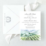 save the date with watercolor vineyard design and envelope with grey monogram return addressing