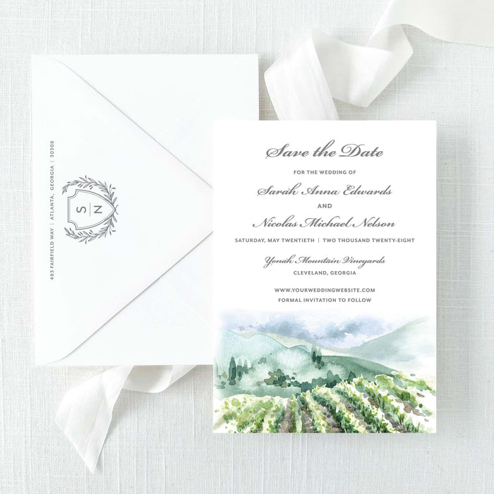 save the date with watercolor vineyard design and envelope with grey monogram return addressing