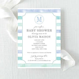 boy baby shower invitation with blue green watercolor stripes and a monogram printed on cardstock.