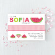 pink and green birthday invitation featuring a watermelon design and a gingham pattern