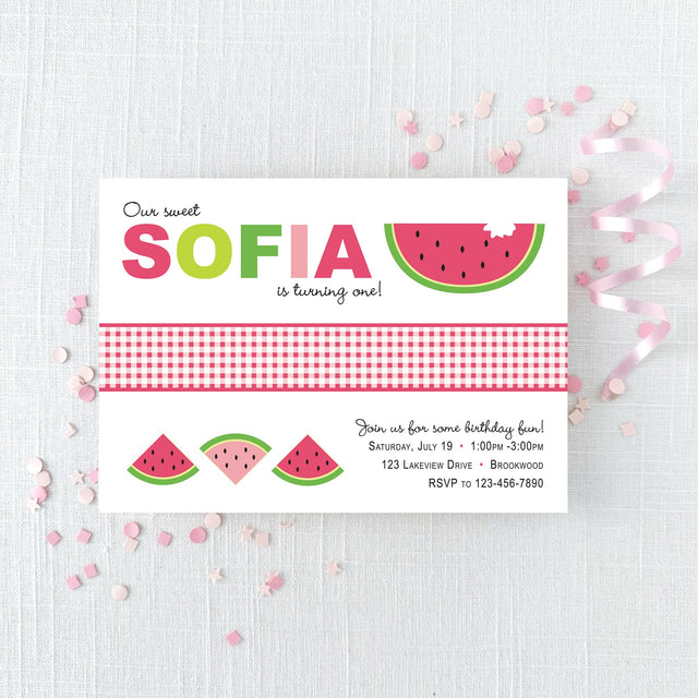 pink and green birthday invitation featuring a watermelon design and a gingham pattern