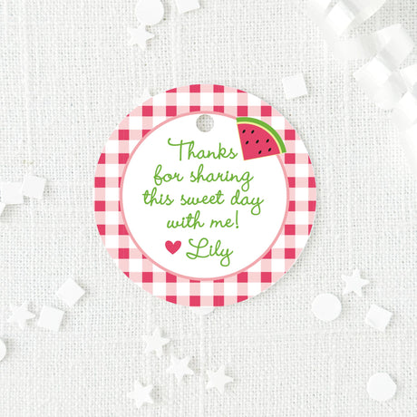 pink and green round favor tag with watermelon and gingham border design
