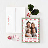 red and green wavy dots christmas holiday card with envelope featuring return address