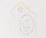 wedding invitation and envelope printed in grey on handtorn cotton cardstock with monogrammed envelope liner